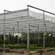 Greenhouse construction with special screening system, resistant to outside weather conditions.